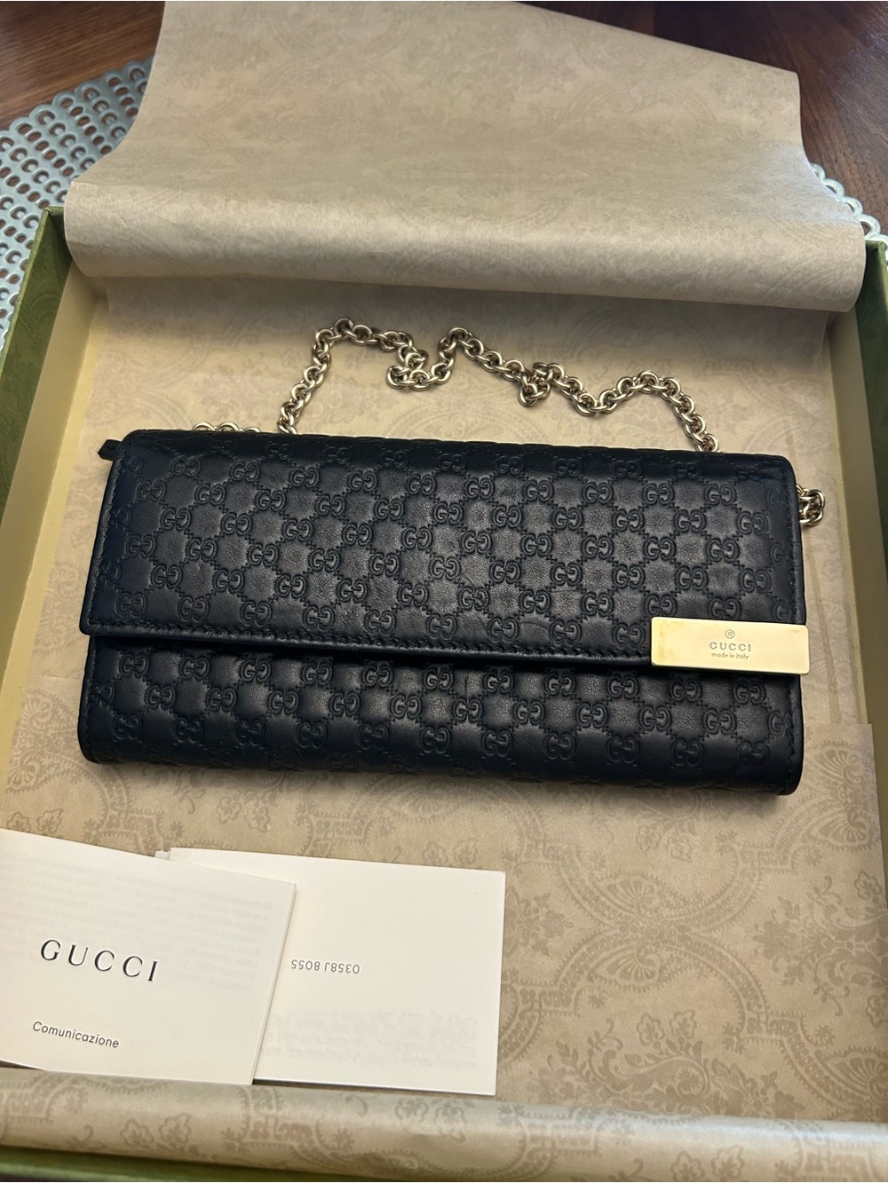 Gucci Black GG Embossed Leather Chain Wallet with Silver Hardware